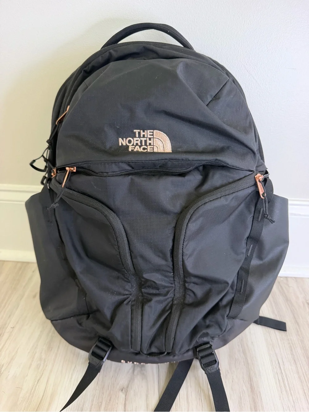 The North Face Black Backpack with Rose Gold Hardware